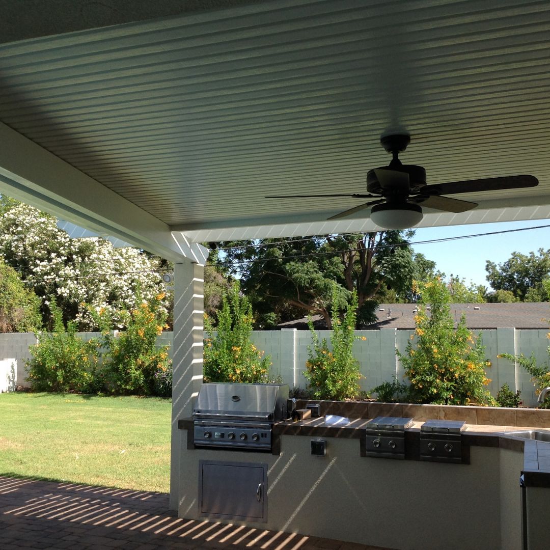 solid pergola with fan