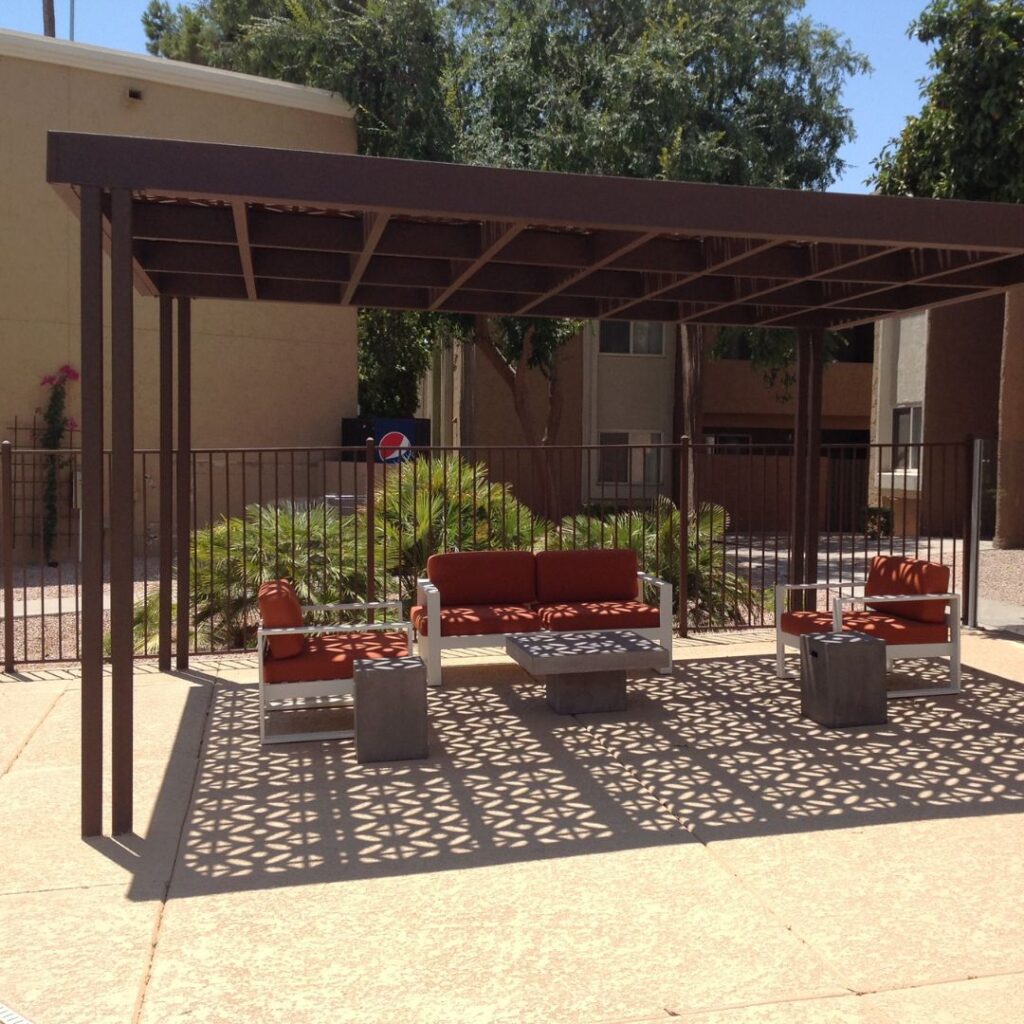 Brown pergola with seating underneath