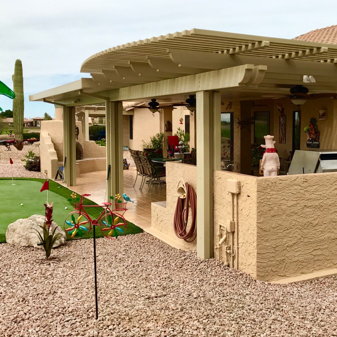 southern style patio with wooden cover, cactus in background