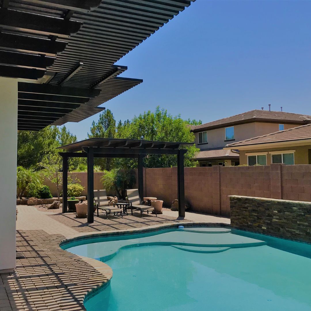 a pergola shading outdoor furniture
